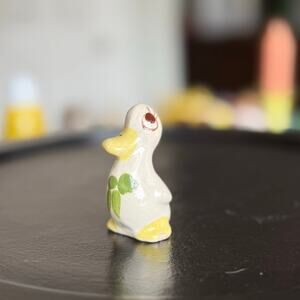 Vintage Hand-Painted Ceramic Duck Figurine with Green Leaf Detail